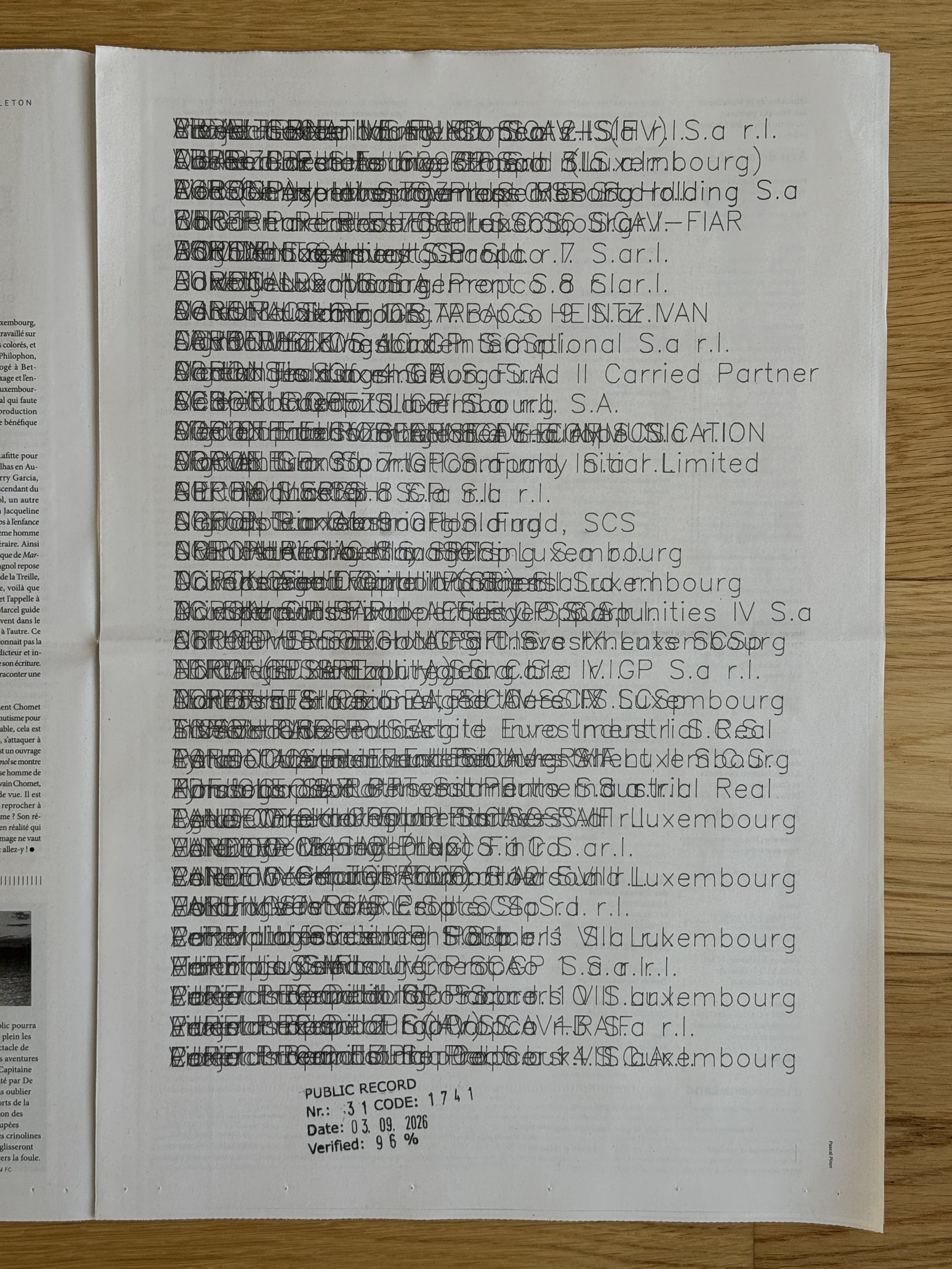 Page 21 of d'Lëtzebuerger Land: the Public Record sheet for 31 rue de Hollerich printed across the whole newspaper page, the stamp block at the bottom.